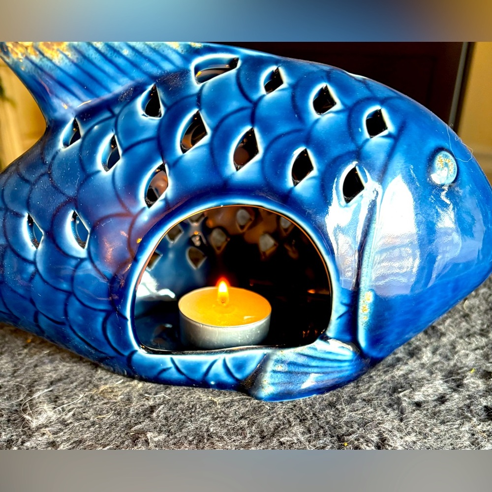 Ceramic Blue Fish Tea light lantern. Like new! Comes w a couple of tea lights!